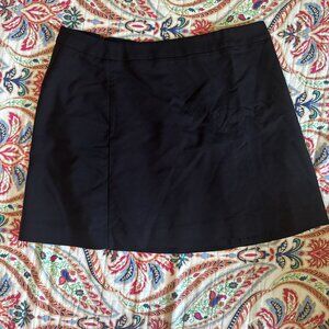 Black mini skirt with pockets